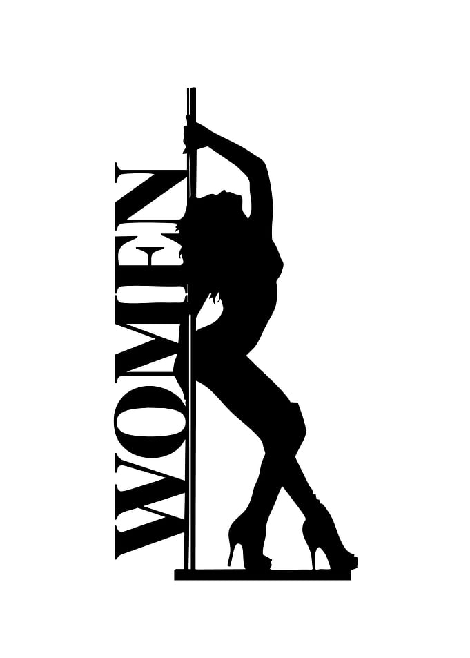 Silhouette of a woman pole dancing