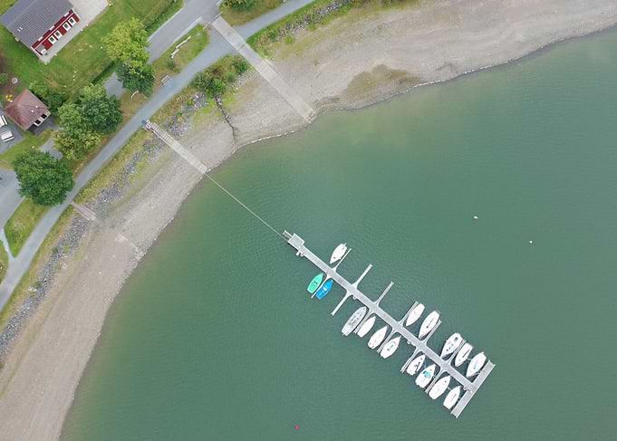 Aerial view of a lake with boats