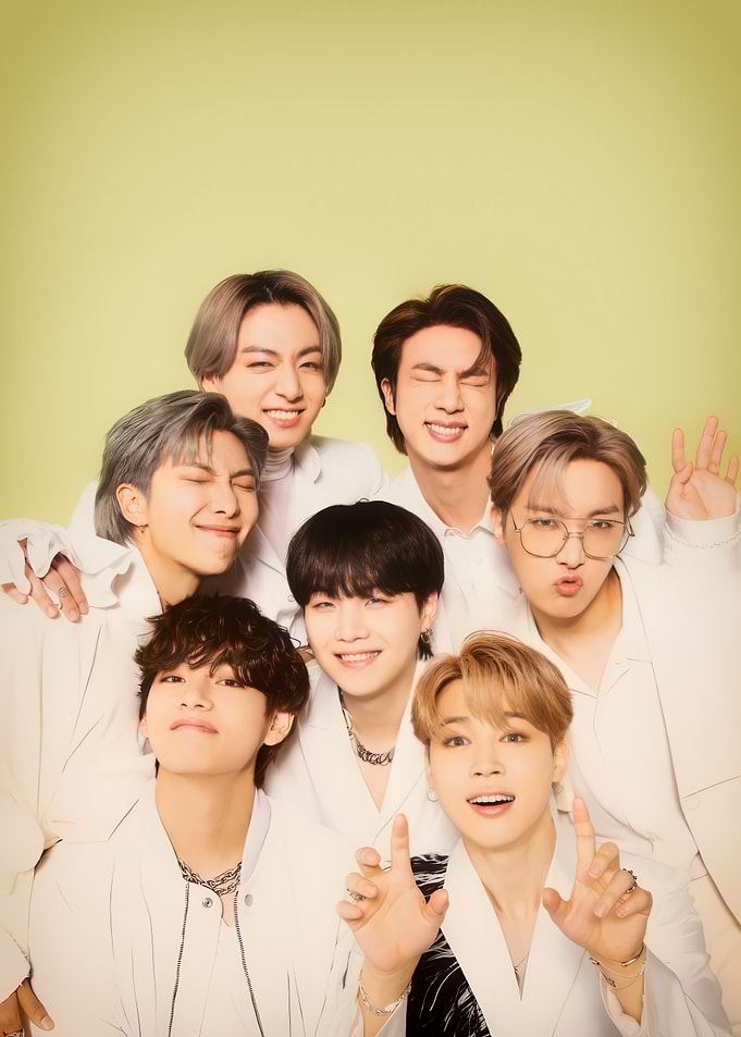 BTS Group Portrait on Yellow Background