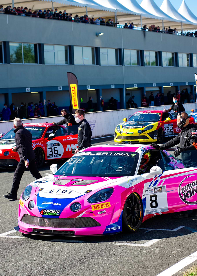 Racing Cars at the Grid