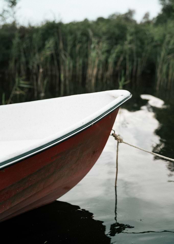 Red and White Boat on Water