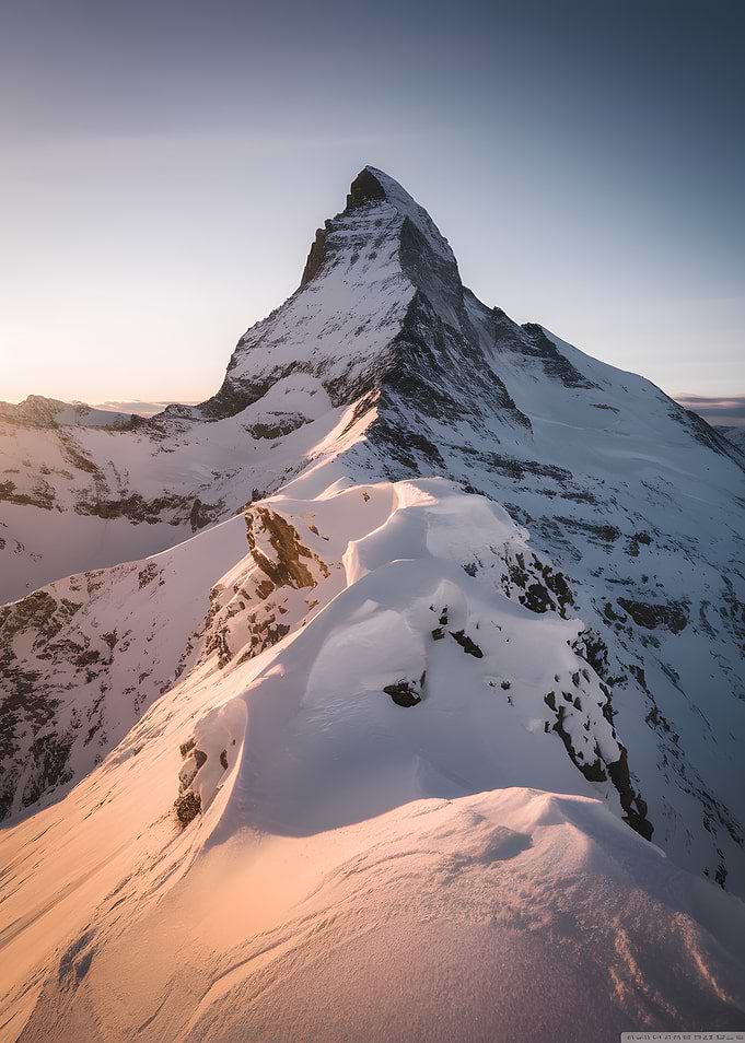 Snowy Mountain Peak at Sunrise
