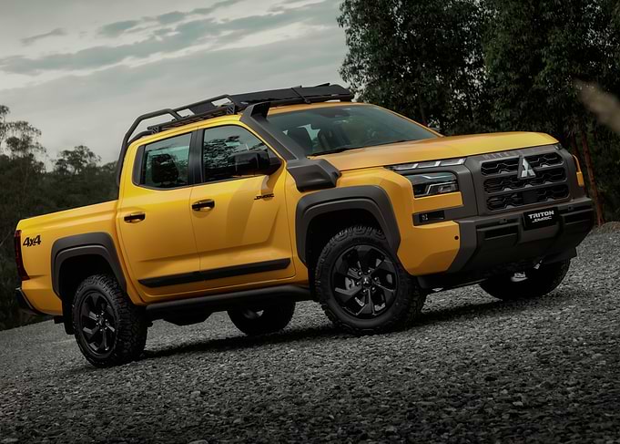 Yellow Mitsubishi Triton Pickup Truck