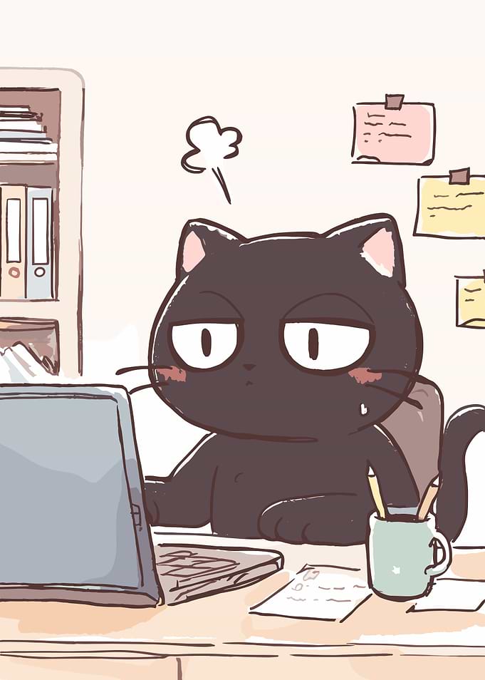 Tired Black Cat Working on Laptop