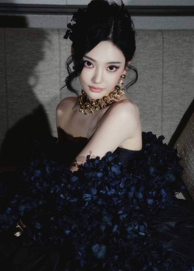 Elegant Woman in Dark Floral Dress