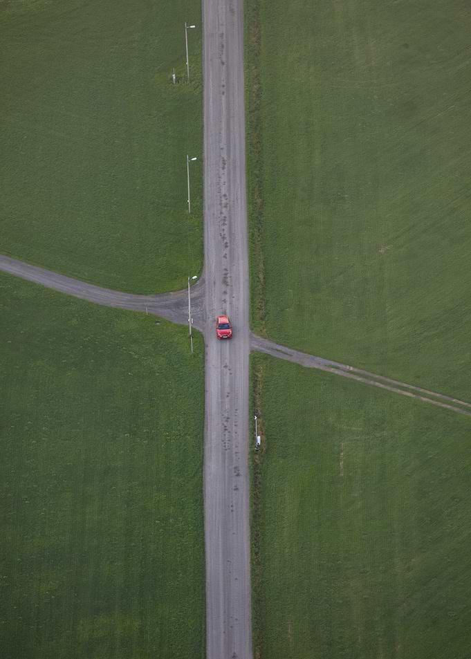 The Red Car on the lonely road