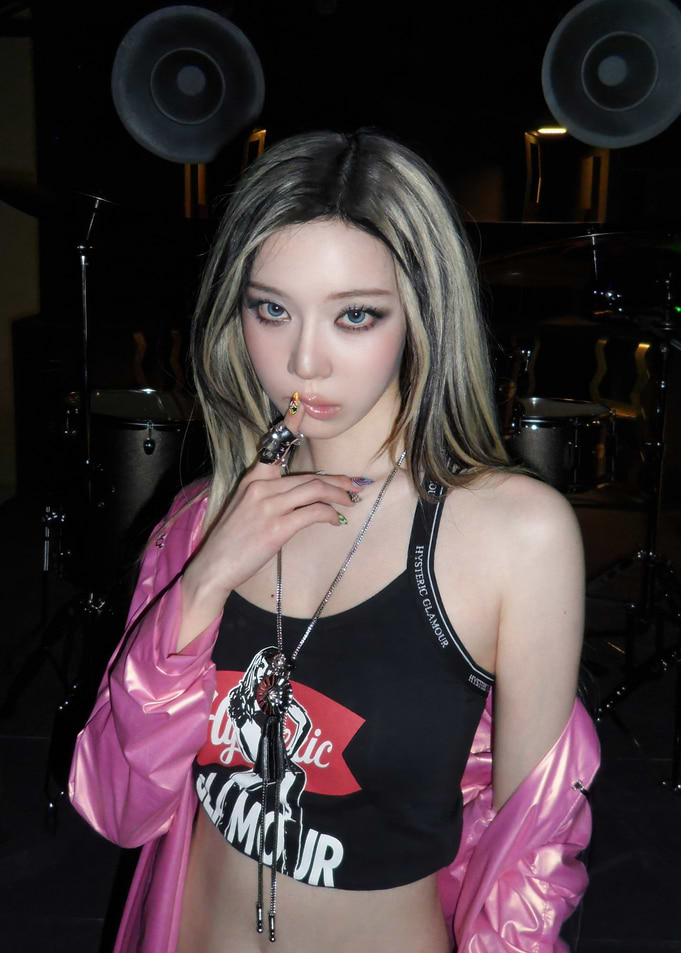 Blonde woman with cigarette and jewelry