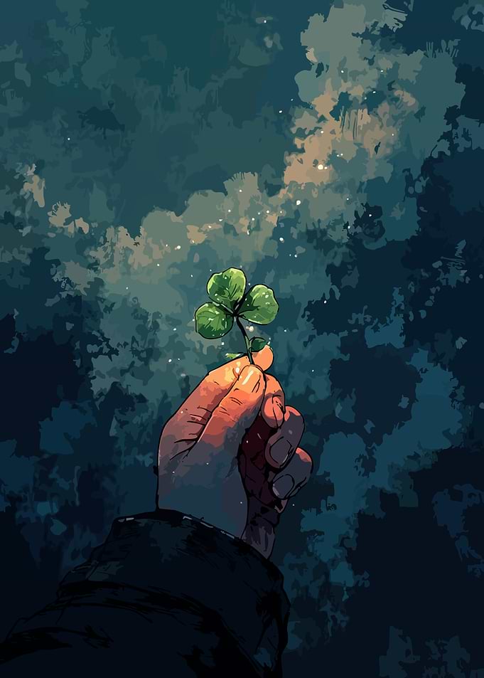 Hand Holding a Clover