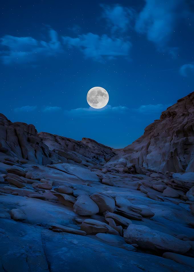 Full Moon over Rocky Landscape