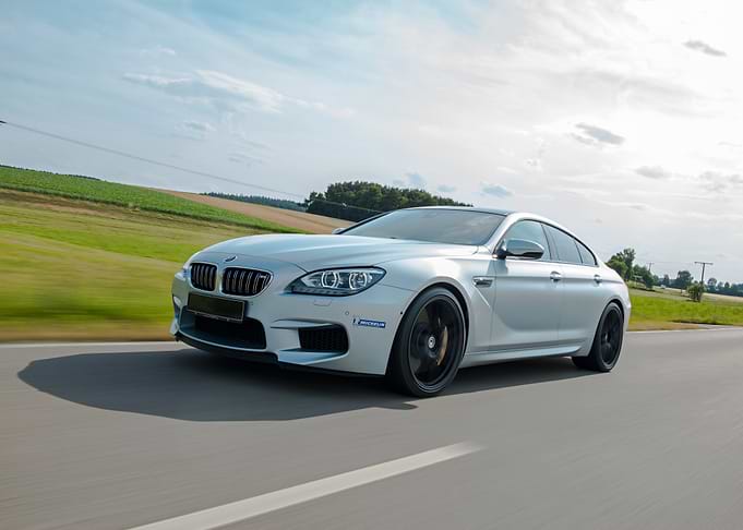 Silver BMW M6 Gran Coupe on Road
