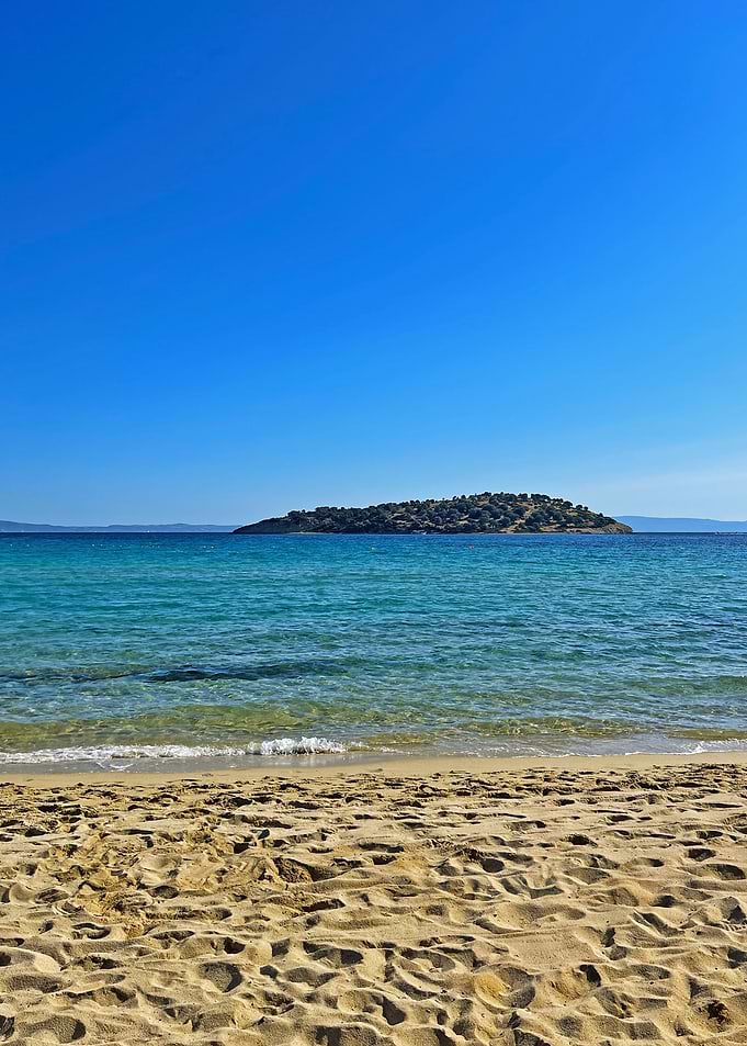 Beach with Island and Blue Sky