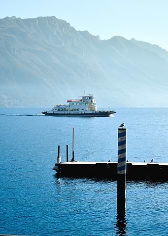 Lake Como Ferry in the Alps Mountains