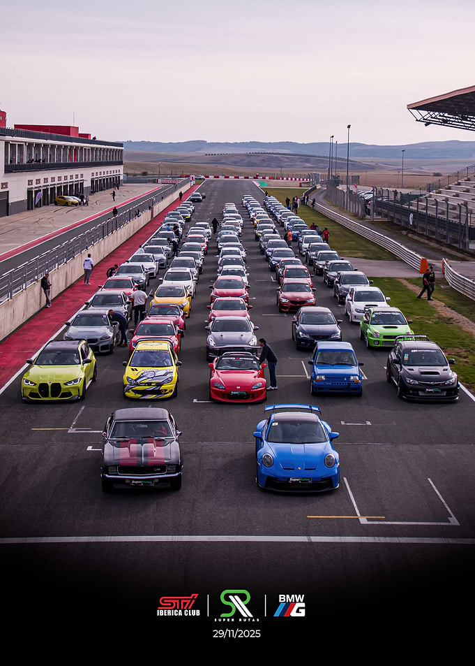 Cars lined up on race track