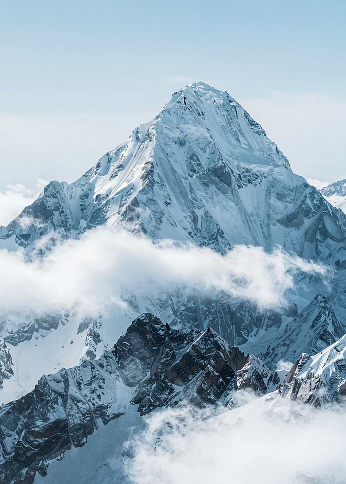 Snowy Mountain Peak with Clouds