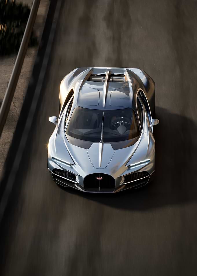 Silver Bugatti Chiron speeding on road