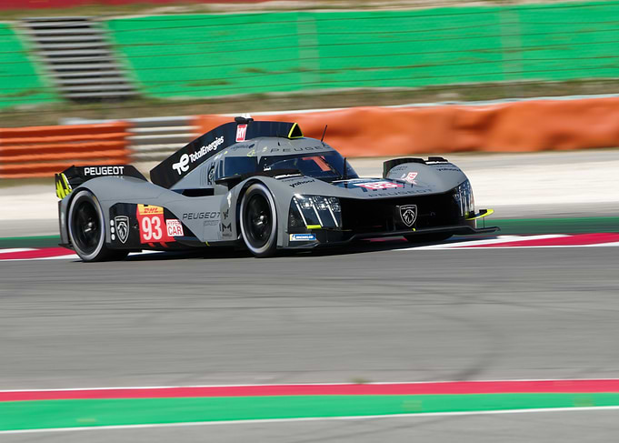 Peugeot Racing Car on Track