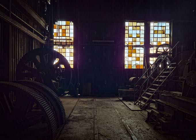 Abandoned Industrial Interior with Large Gears