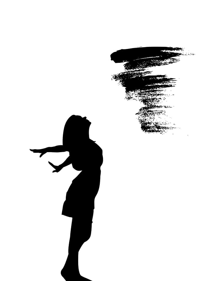 Silhouette of Woman with Abstract Tornado