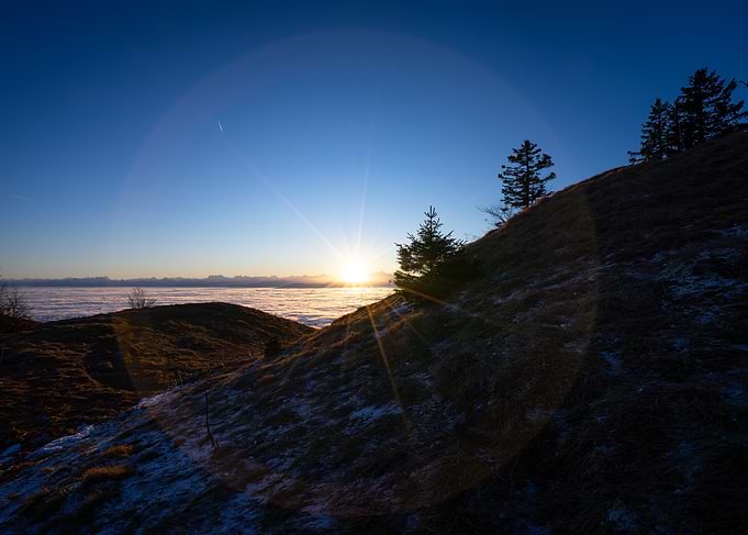 Mountain Sunrise Above Clouds