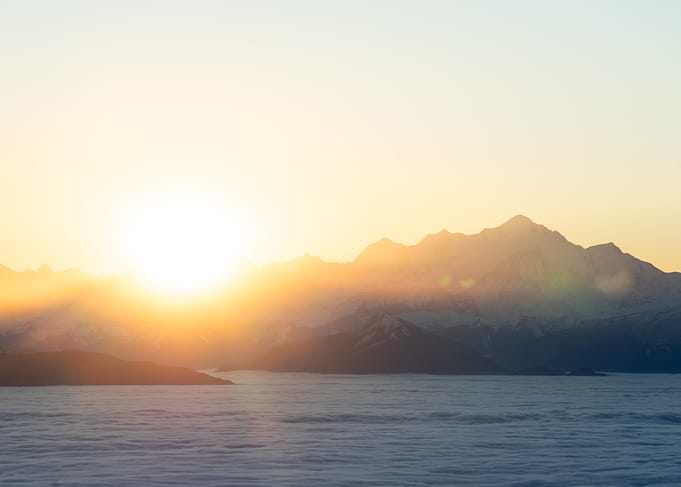 Mountain Peaks Above Sea of Clouds