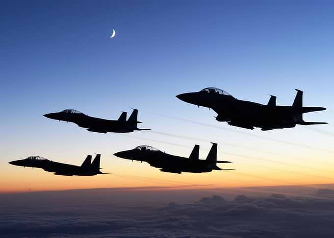 F-15 Eagles in Flight at Sunset