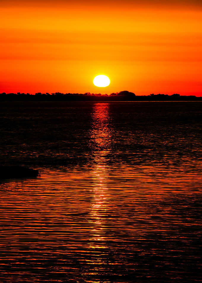 Fiery Sunset Over Water