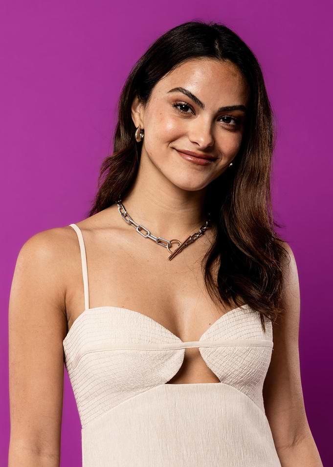 Camila Mendes portrait on purple background