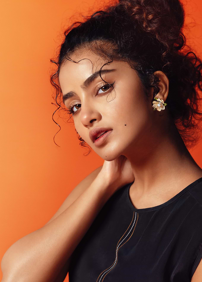 anupama Portrait of a Woman on Orange Background