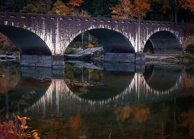 Stone Bridge Reflection in Autumn