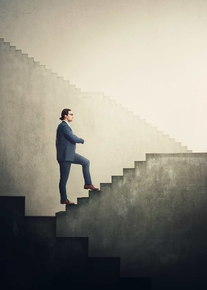Man Climbing Concrete Staircase
