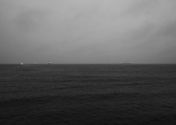 Monochrome Seascape with Distant Lights