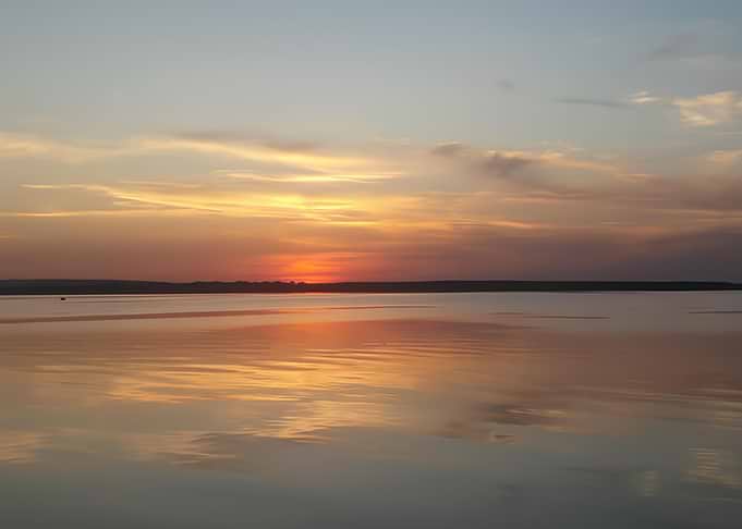 Serene Lake Sunset Reflection