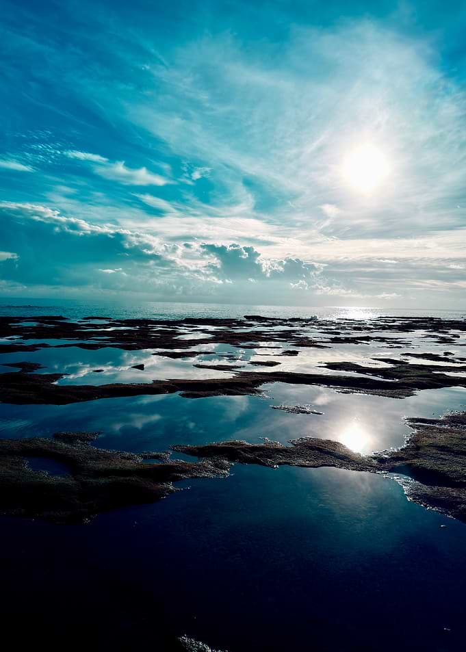 Ocean Tide Pools Reflecting Sky