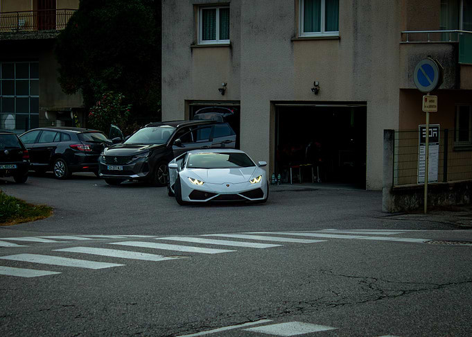 White Lamborghini parked on the street