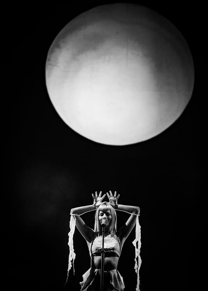 Black & White portrait of Aurora performing under the Moon