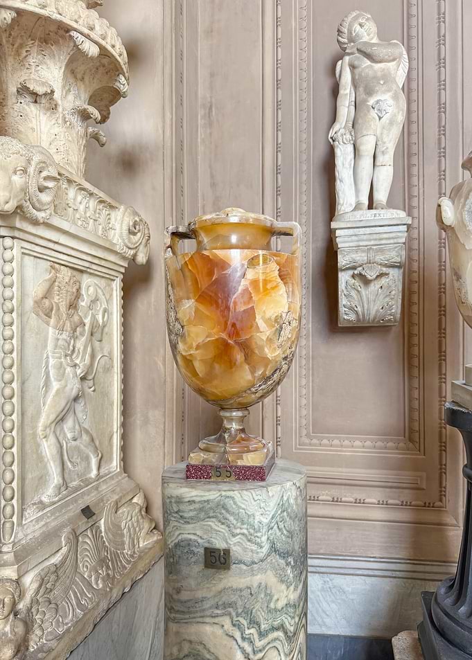 Ornate Marble Vase and Statues