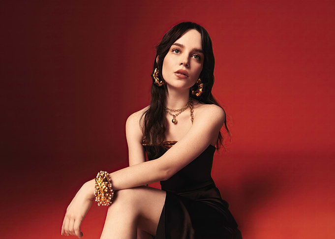 sophie thatcher in Black Dress with Gold Jewelry