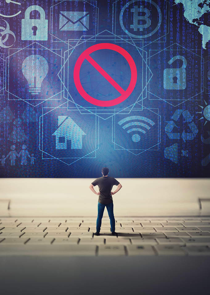 Cybersecurity concept with man on keyboard