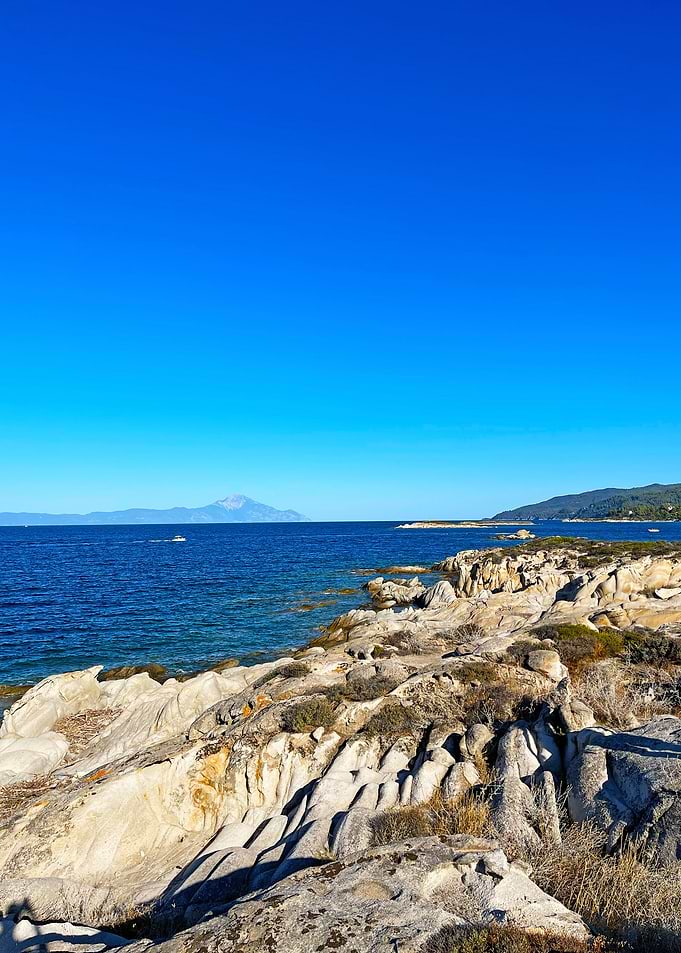 Rocky Coastline with Blue Sea and Sky