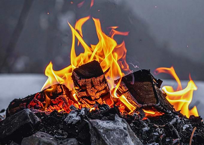 Burning Firewood with Flames and Smoke