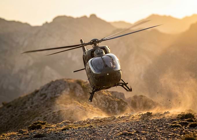 Helicopter Dusting Off Mountain Top