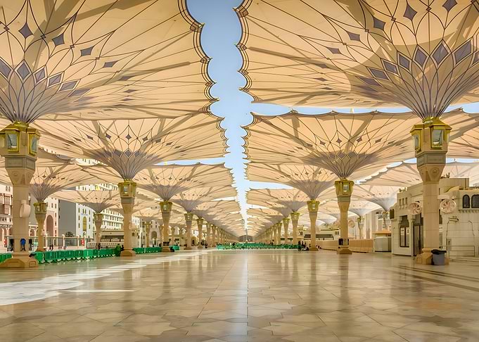 Mosque courtyard with umbrella structures