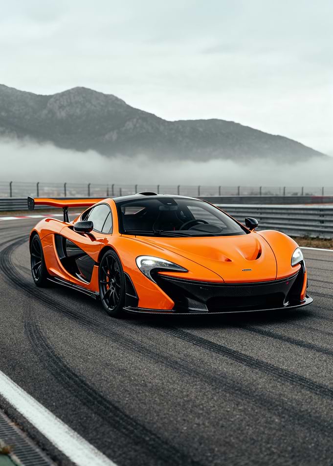 Orange McLaren P1 on Racetrack