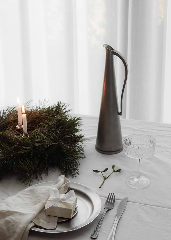 Elegant Holiday Table Setting with Gift