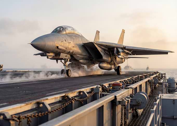 F-14 Tomcat landing on aircraft carrier