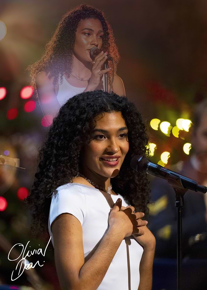 Olivia Dean performing on stage