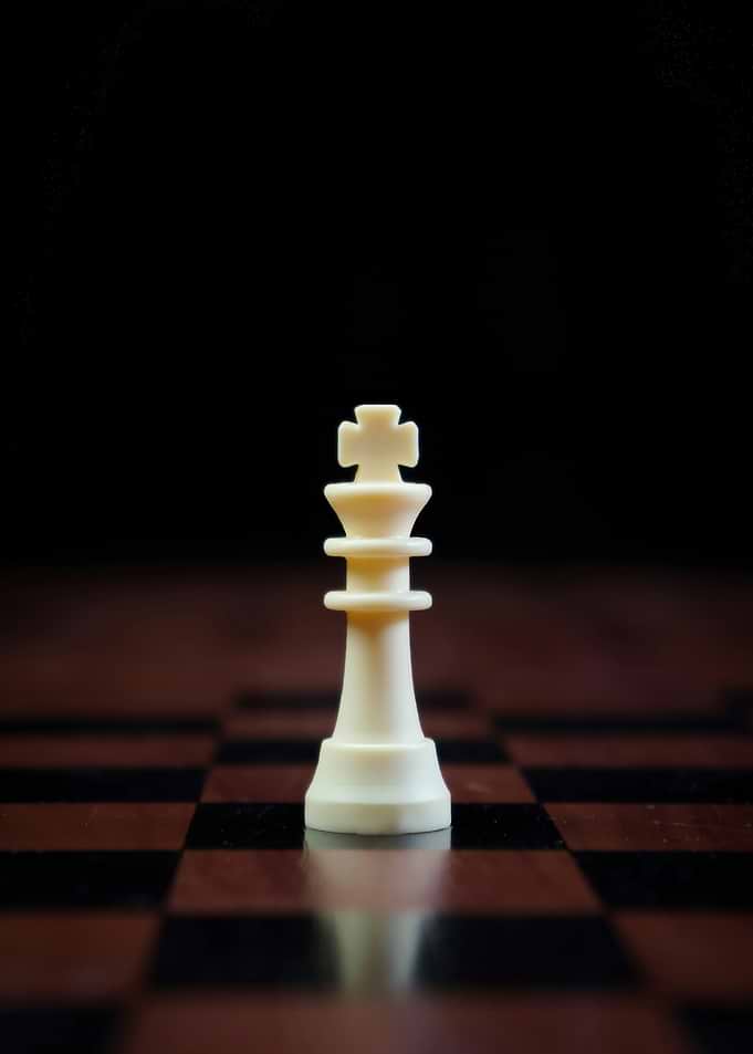 White King Chess Piece on Board