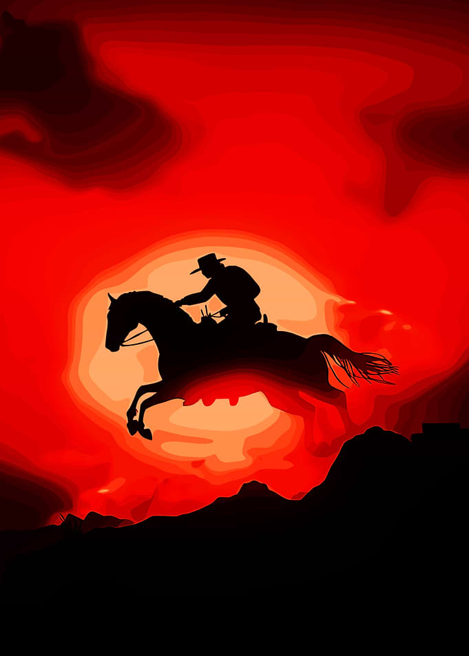 Silhouette of Cowboy Riding Horse at Sunset