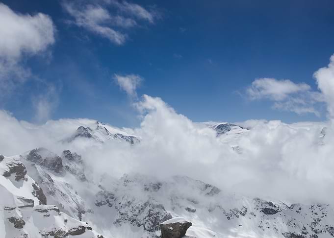 Snowy Mountains and Clouds