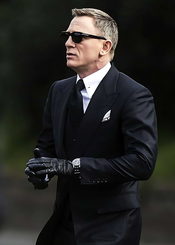 Daniel Craig in Black Suit and Gloves